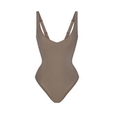 SKIMS BODY UNLINED PLUNGE THONG BODYSUIT | MINK