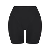 SKIMS BODY BUTT AND HIP ENHANCING MID THIGH SHORT | ONYX