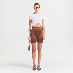 NikeSKIMS SATIN SHINE BONDED WAIST 7" BIKER SHORT | CAROB BROWN