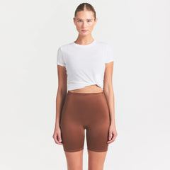 NikeSKIMS SATIN SHINE BONDED WAIST 7" BIKER SHORT | CAROB BROWN