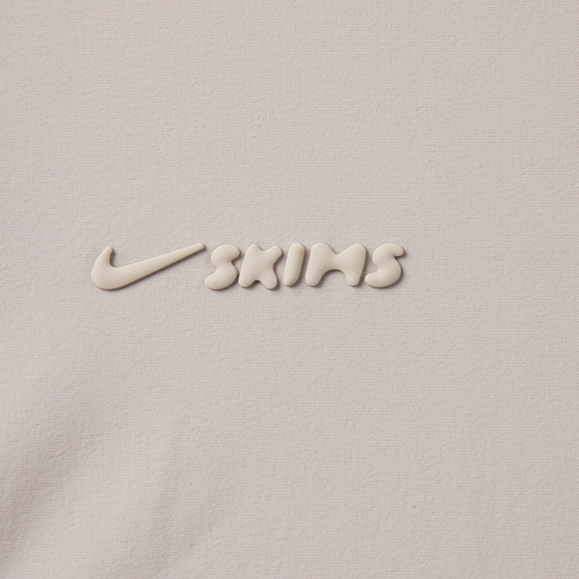 NikeSKIMS WOVEN NYLON CROP JACKET | STONE