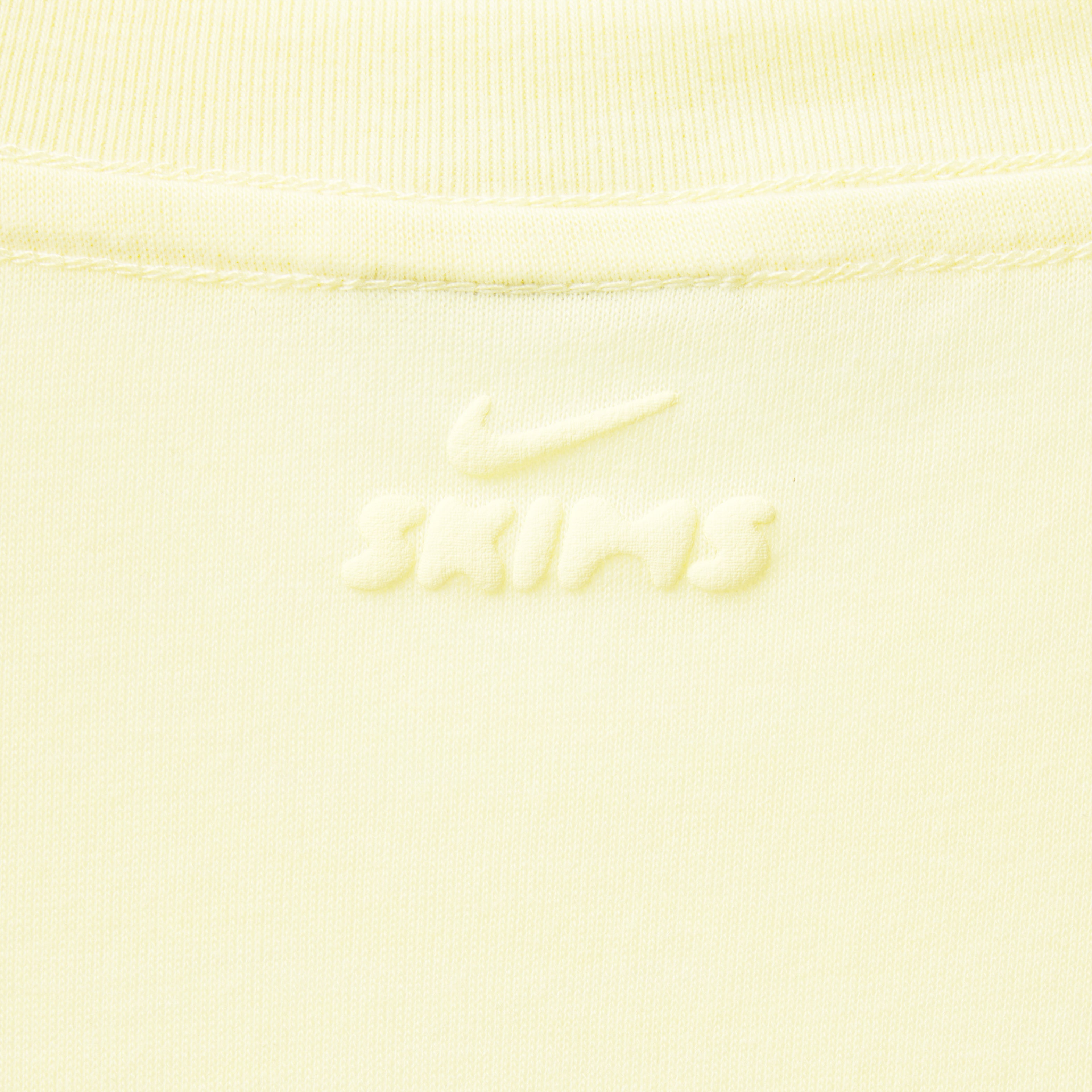 NikeSKIMS PERFORMANCE COTTON BLEND CROP TWIST TANK | BICYCLE YELLOW