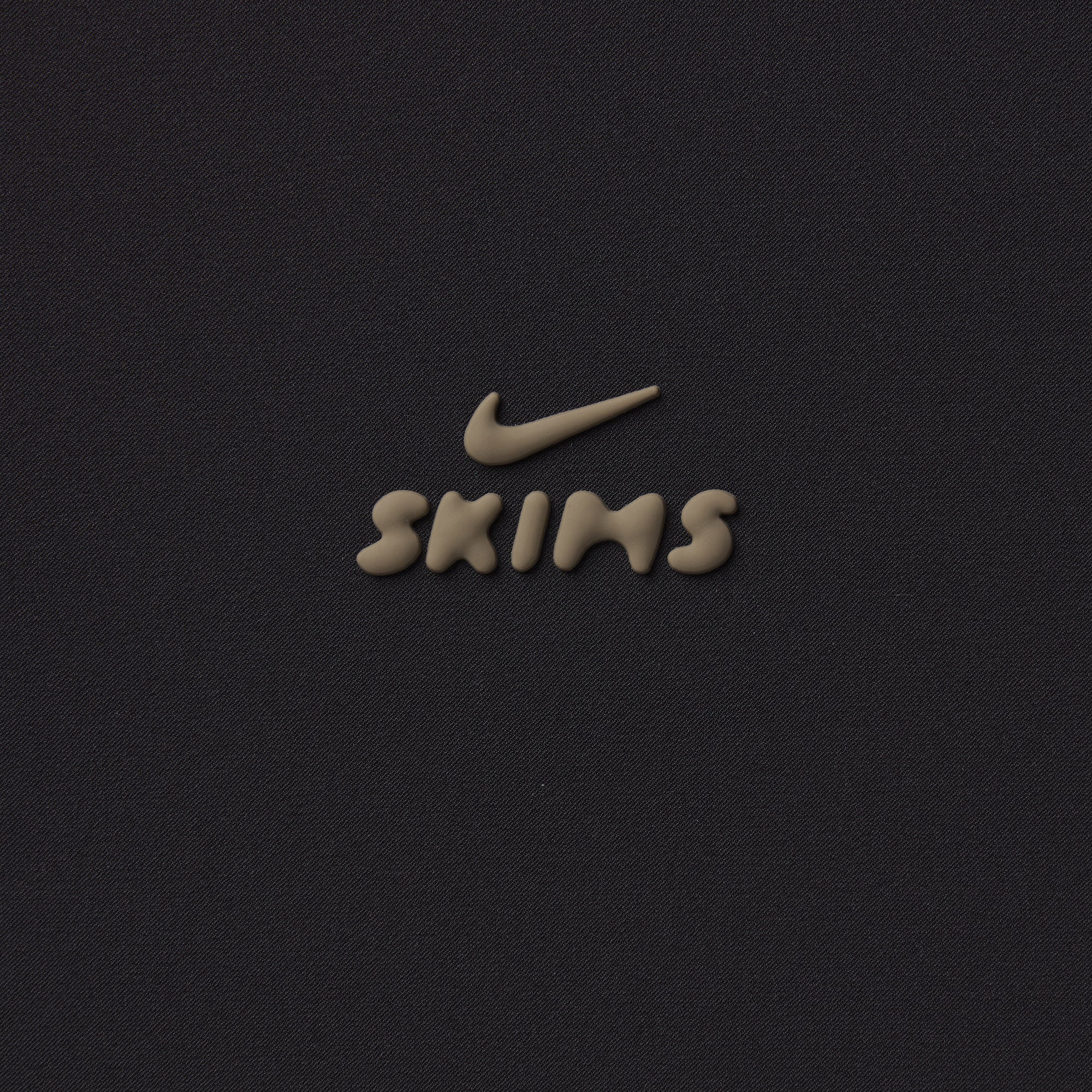 NikeSKIMS STRETCH NYLON OVERSIZED TRACK JACKET | OBSIDIAN OLIVE GREY