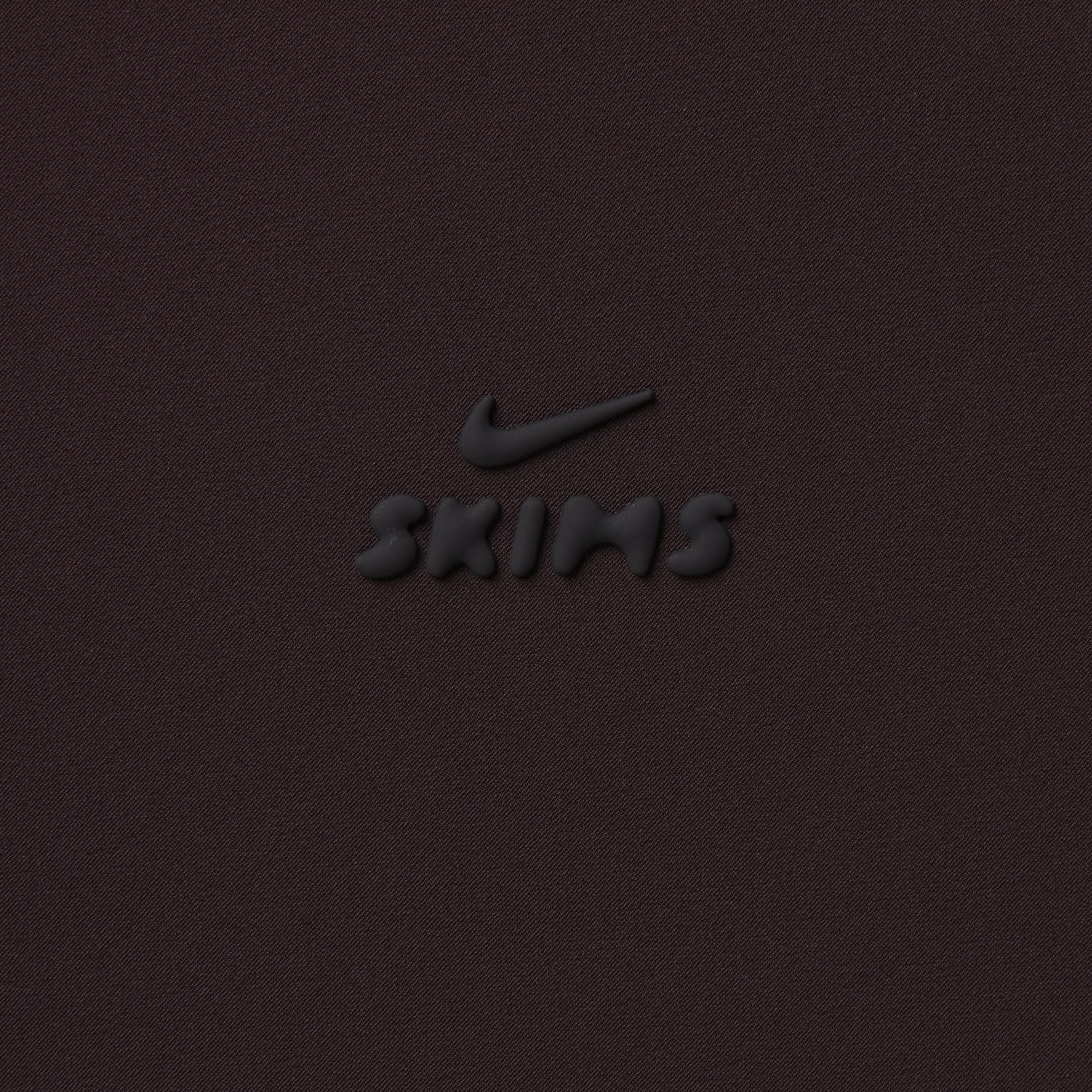 NikeSKIMS STRETCH NYLON OVERSIZED TRACK JACKET | DARK ROAST